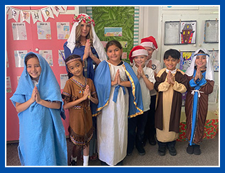 teacher and students dressed in costumes